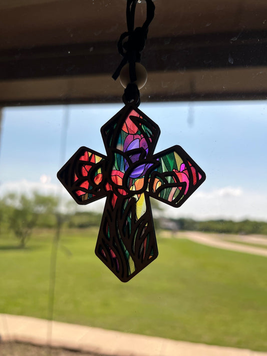 Tulip Multicolored Suncatcher made of natural wood and acrylic, featuring vibrant colors and a rustic-modern design lighted.