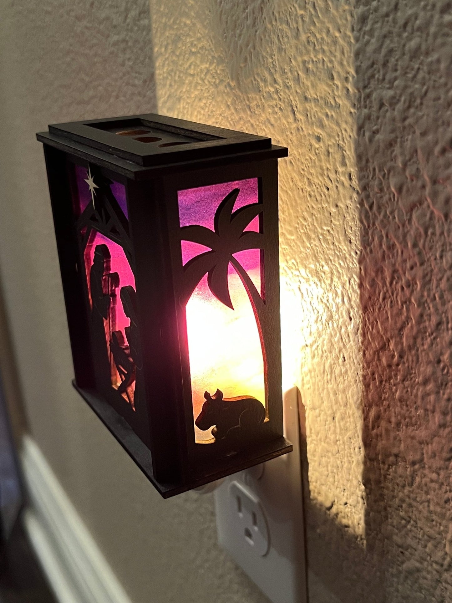 Black wood and multicolor acrylic Christmas Nativity Lantern Nightlight lit wight side view.