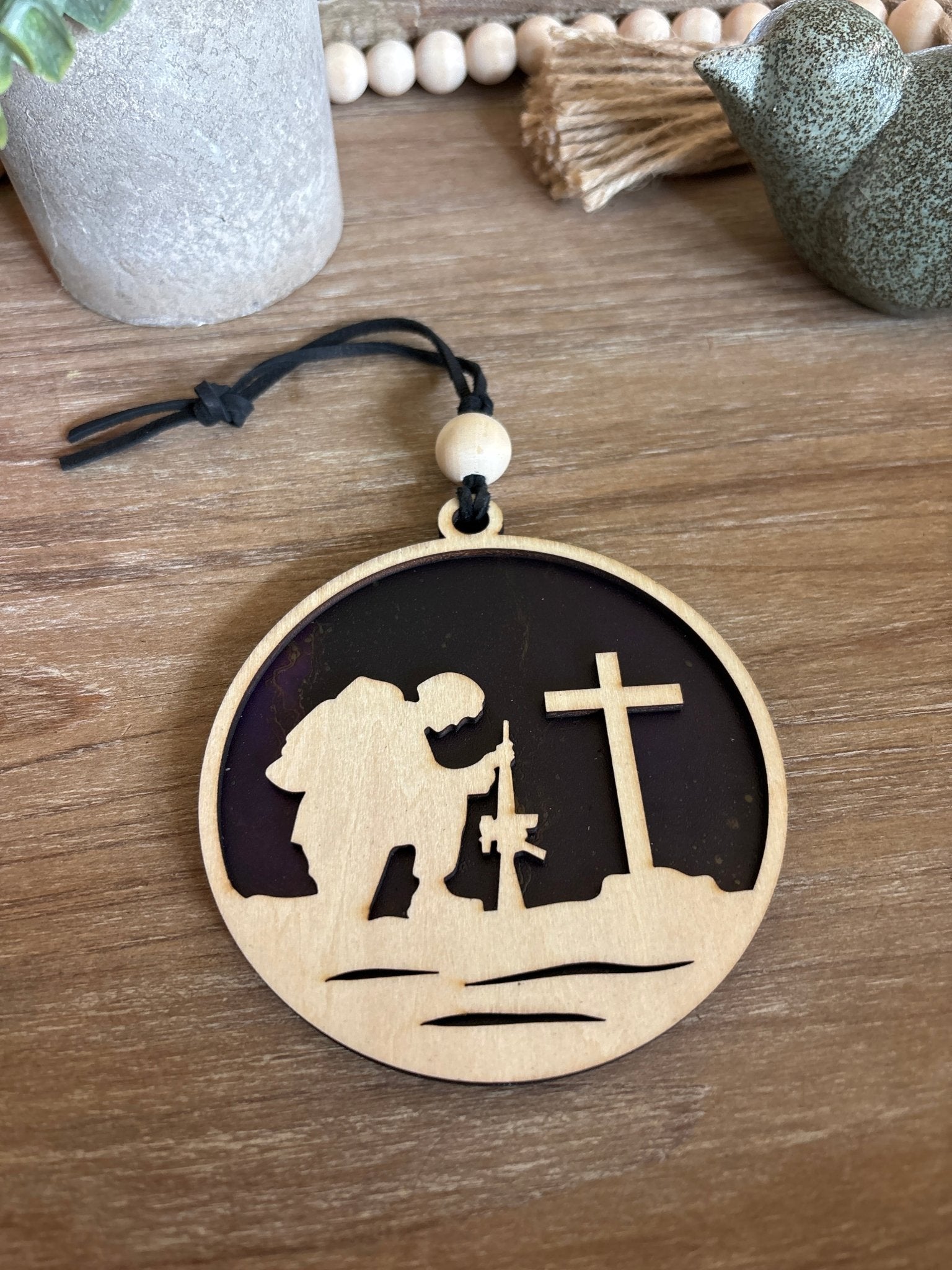 Fallen Soldier suncatcher with natural wood and multicolor acrylic in rustic style.