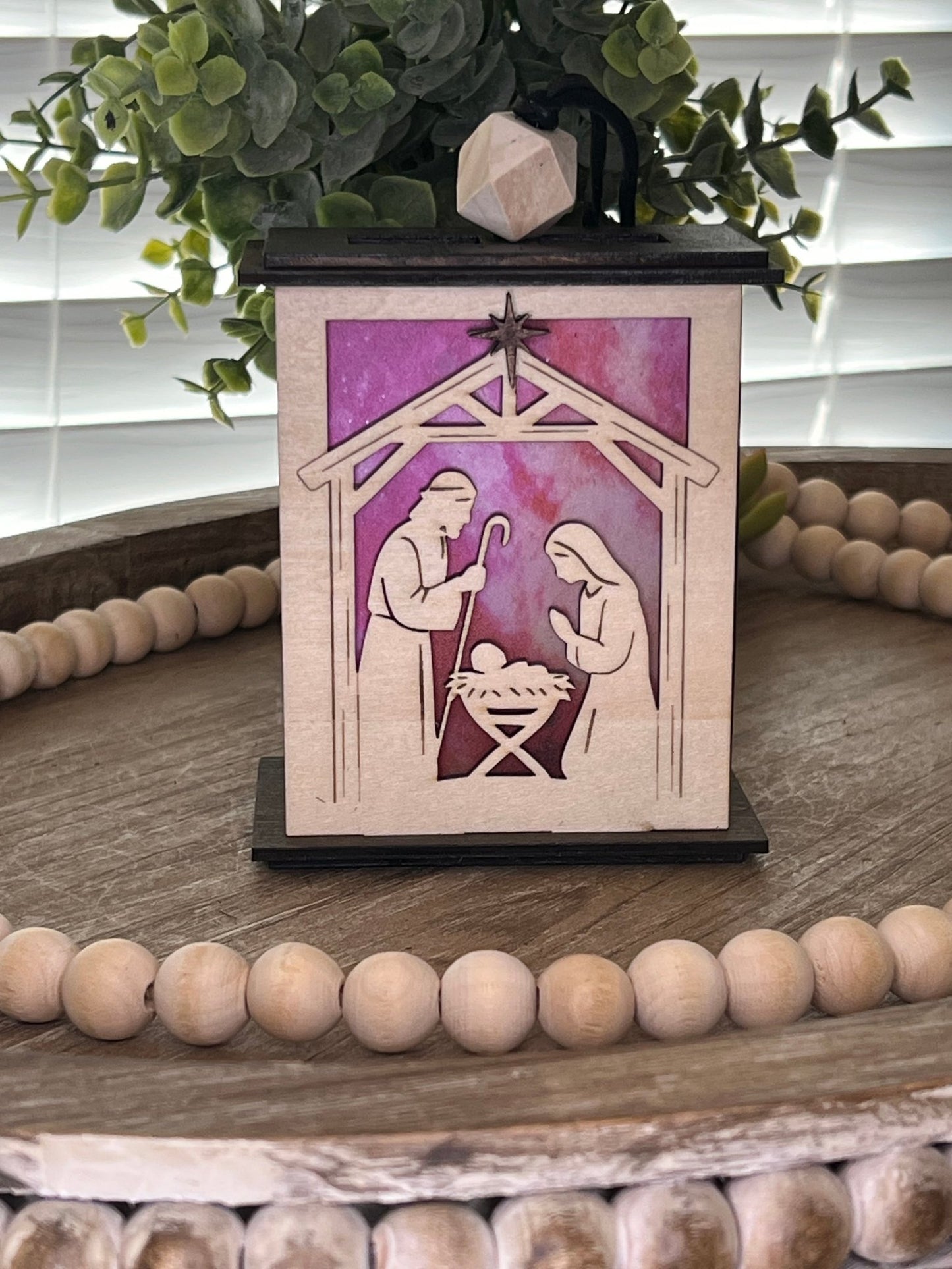 Lighted Christmas Nativity Lantern Ornament made with a natural and walnut stain and acrylic, front, unlighted view.
