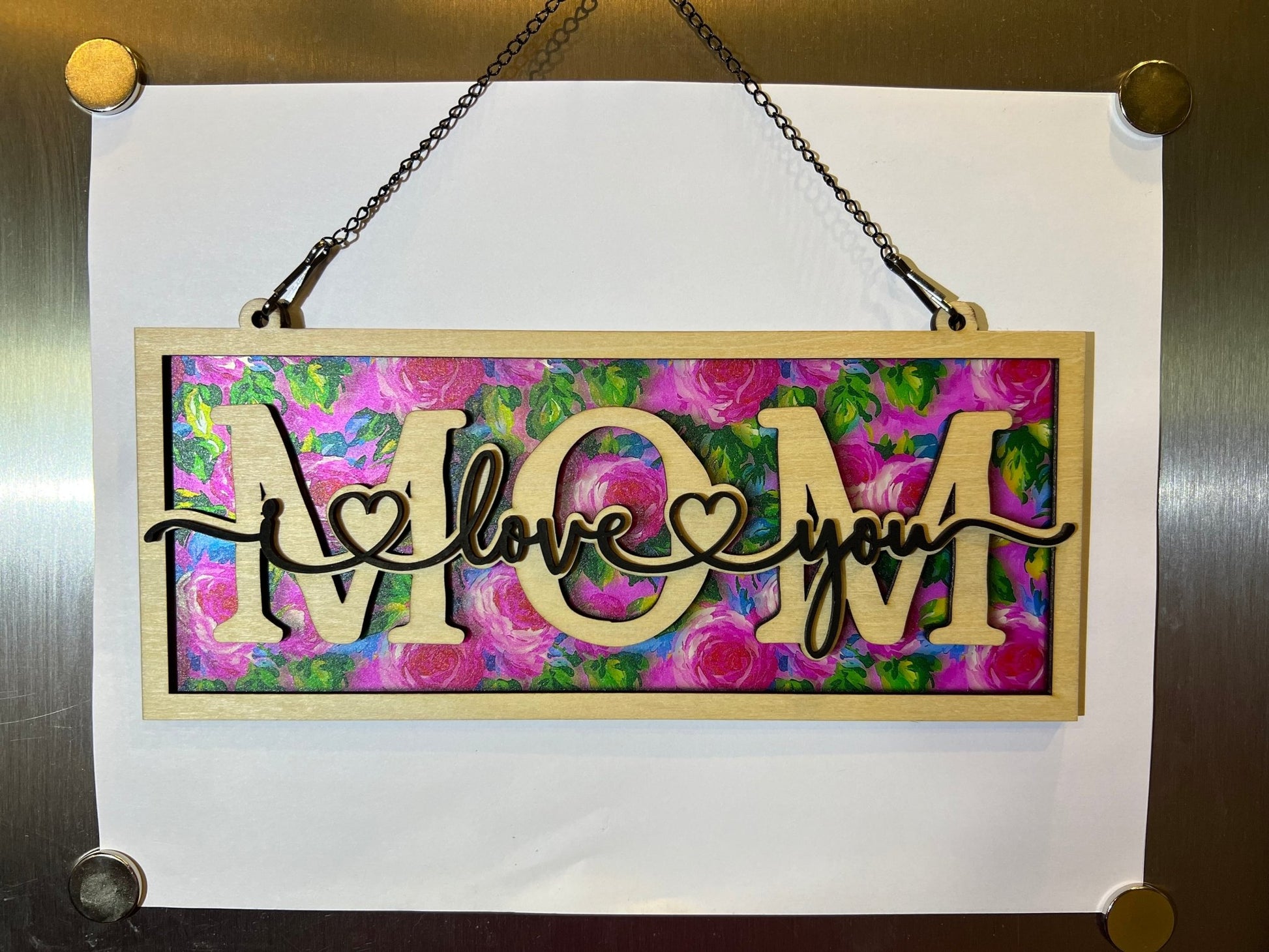 Beautiful mom suncatcher with pink floral design in wood and acrylic, 4.25 x 9.5 inches.