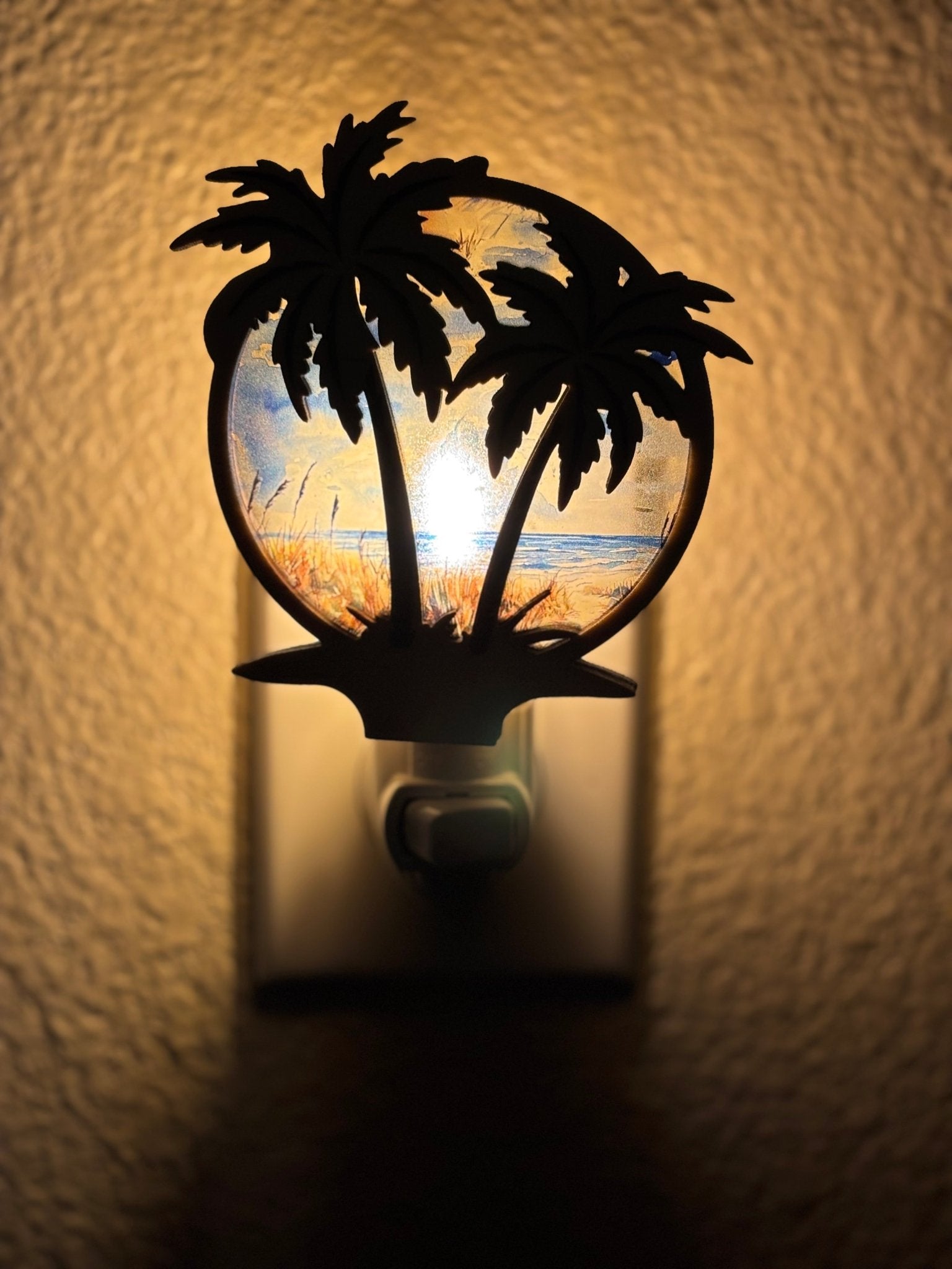 Palm Tree Nightlight with natural wood and multicolor acrylic in a stained glass effect lighted.
