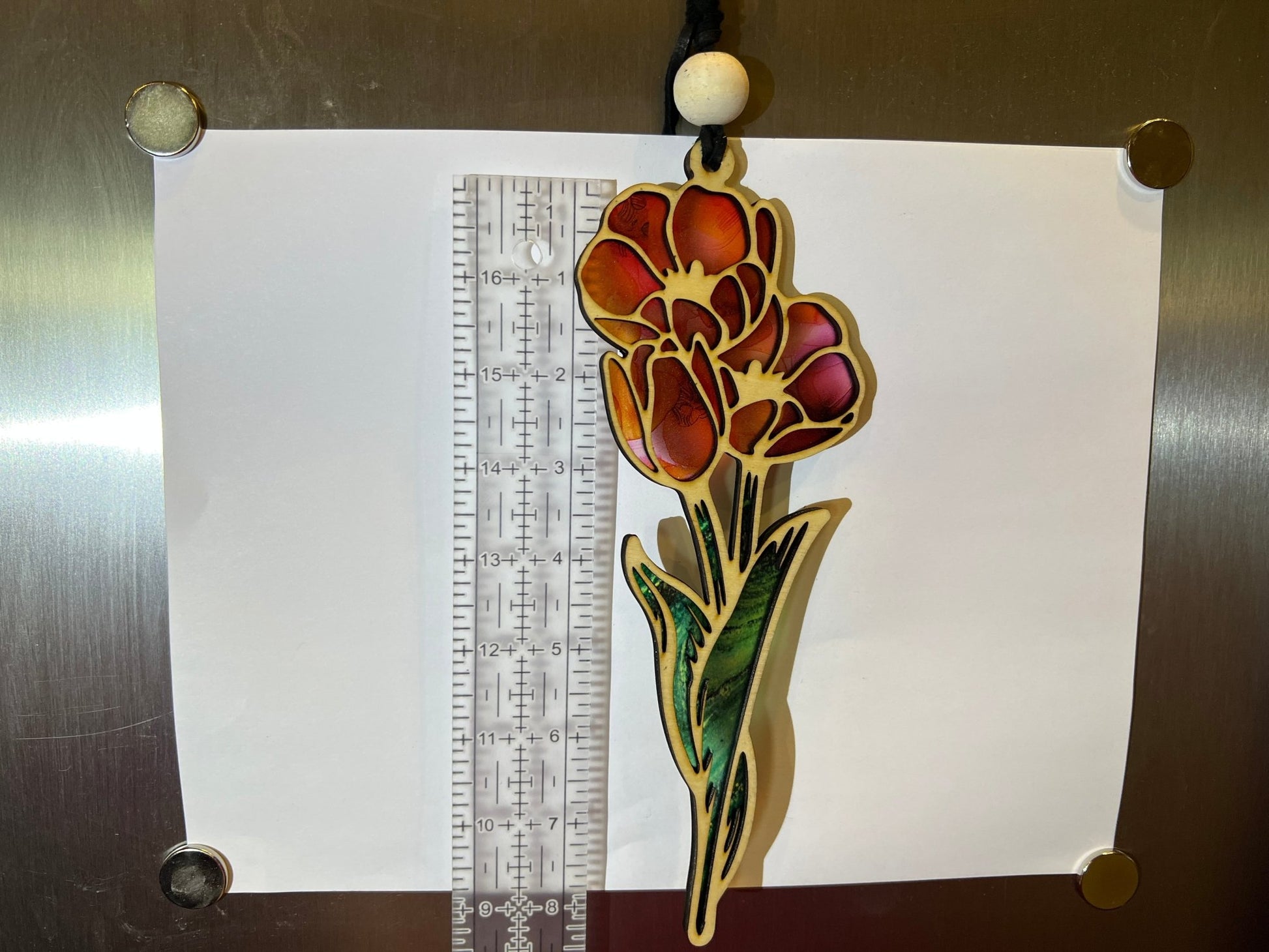Pink and Coral Flowers Suncatcher featuring stained glass effect with acrylic and wood materials unlit.
