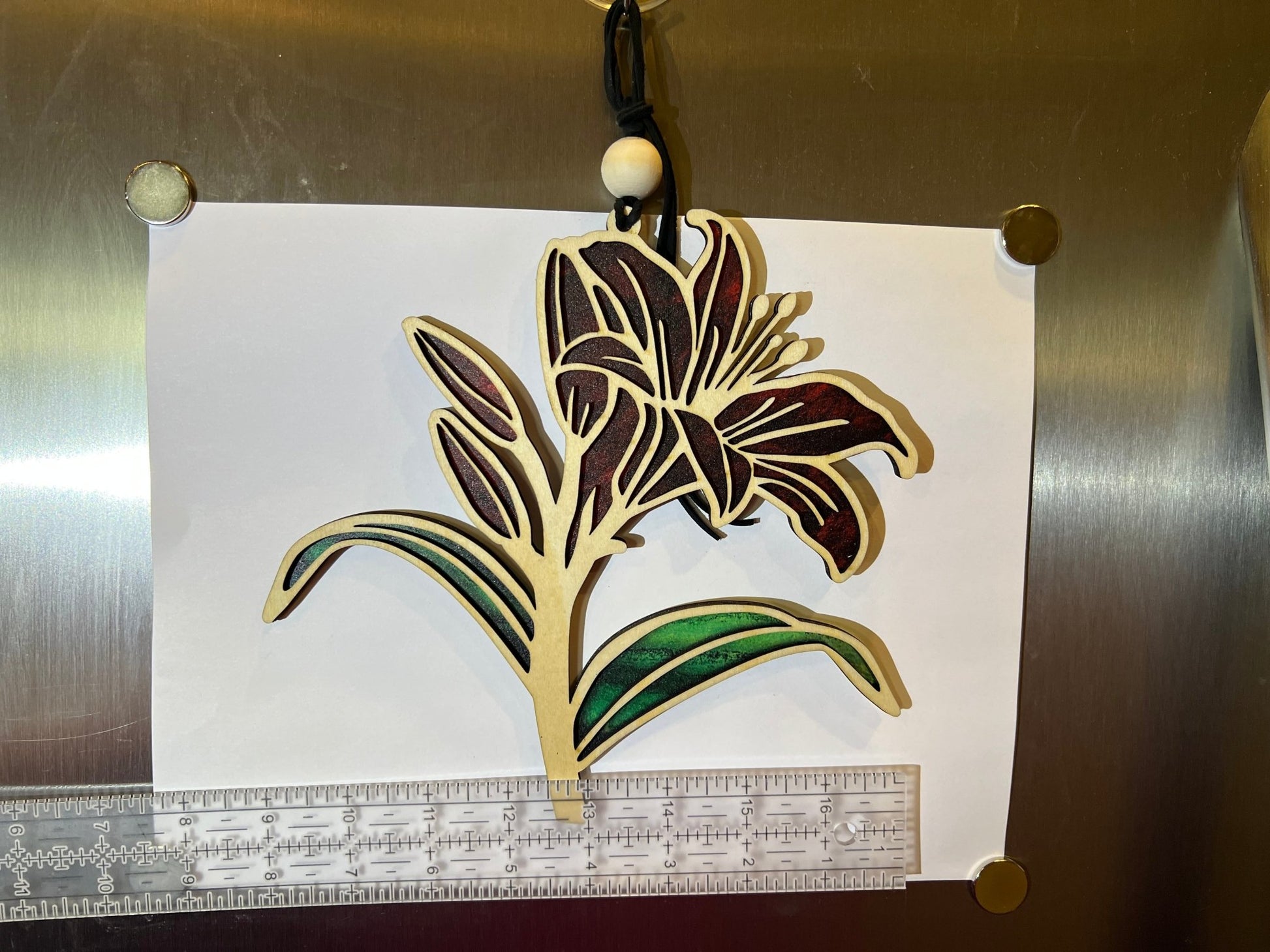 Red Daylily stained glass effect suncatcher with wood and acrylic materials, in 8x8 inches, perfect for rustic home decor.