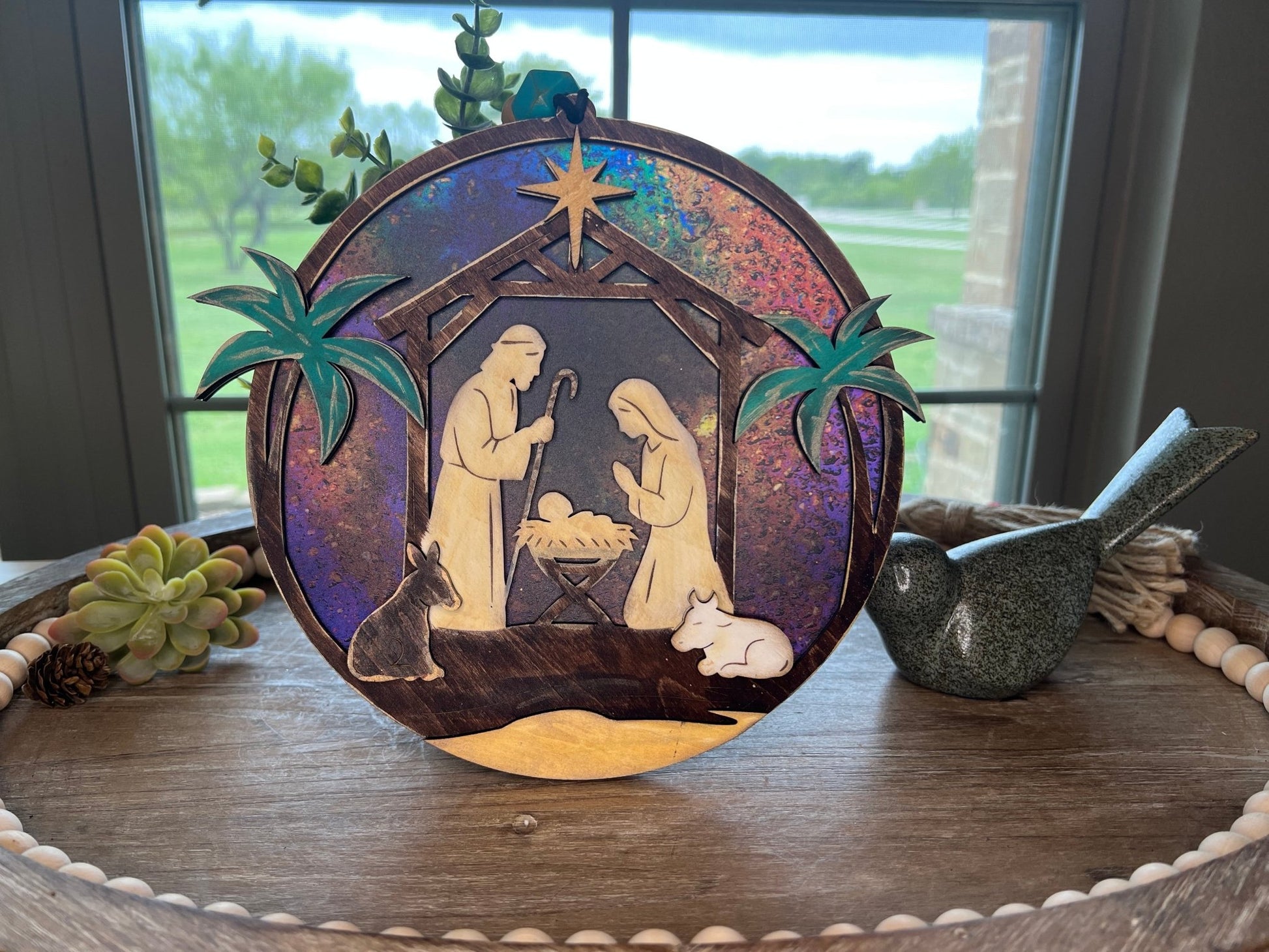 Haunted House Lantern Nightlight with stained glass effect in golden oak wood, perfect for rustic decor - in sunlight.
